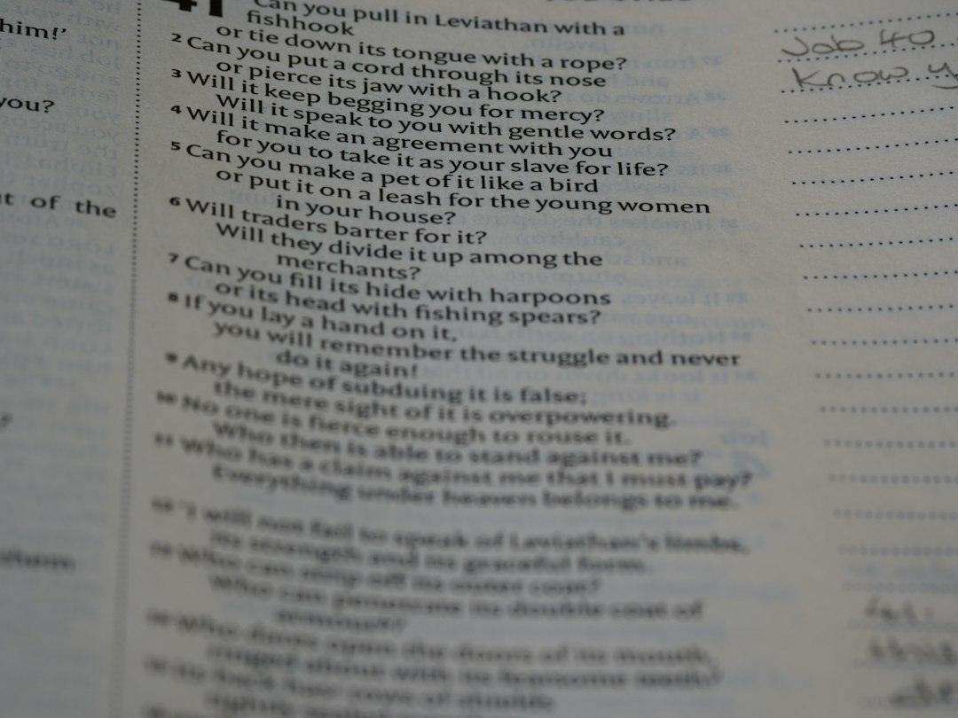 a close up of a book with writing on it